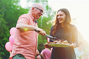 An image of friends enjoying a barbecue