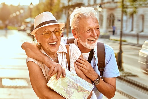Happy older couple enjoying a dream vacation, thanks to Radiant!