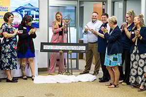 A fun ribbon unveiling at the Ocala Branch